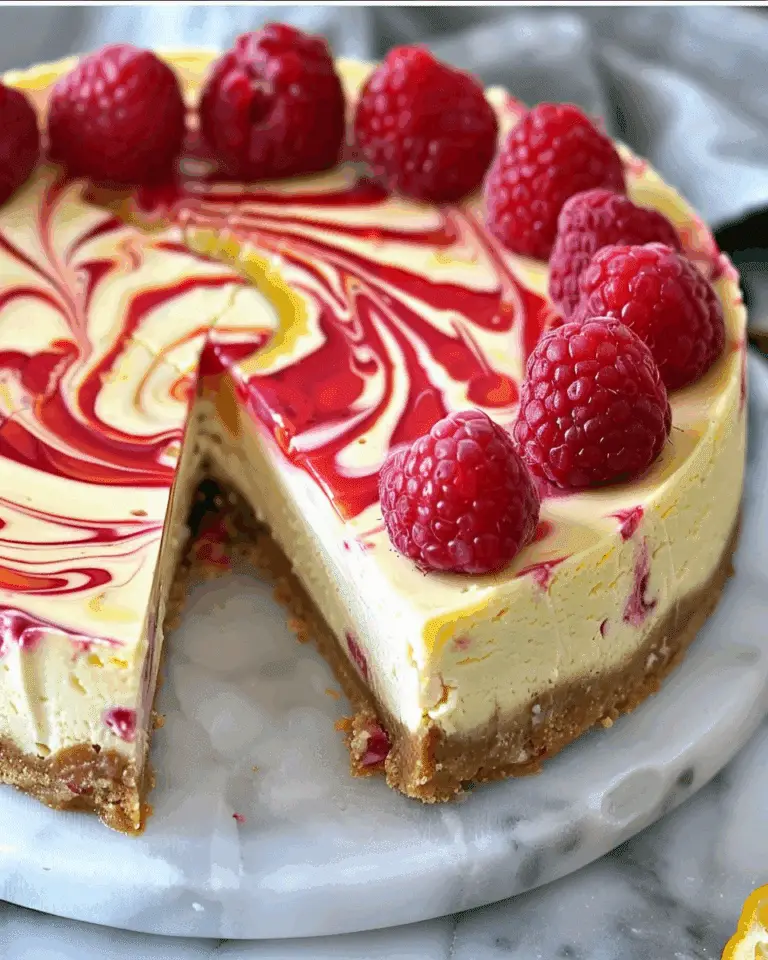 Luscious Lemon Raspberry Swirl Cheesecake