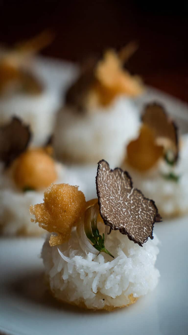 Crispy Rice Cake with Truffle Mushrooms and Fried Leeks
